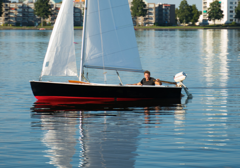 small sailboats with motors